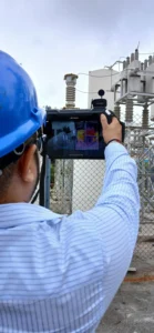 a person using crysound acoustic imager power generation plant