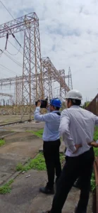 a person using crysound acoustic imager at power generation plant